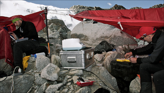 A makeshift laboratory at 5150m on glacial moraine centrifuging samples and performing cardiac echo A makeshift laboratory at 5150m on glacial moraine centrifuging samples and performing cardiac echo